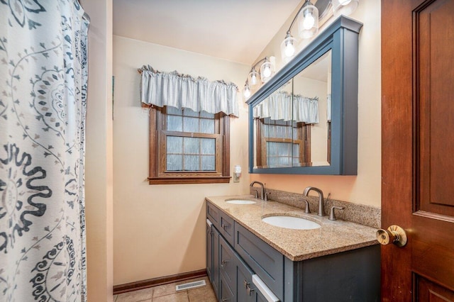 537 Dunkle Rd, Circleville, OH 43113 - full bath featuring double vanity and tile patterned flooring