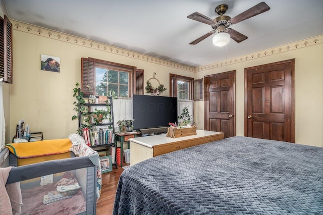 537 Dunkle Rd, Circleville, OH 43113 - bedroom with wood finished floors and a ceiling fan