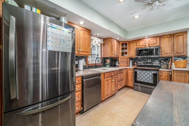 537 Dunkle Rd, Circleville, OH 43113 - kitchen with appliances with stainless steel finishes, light floors, ceiling fan, recessed lighting, and tasteful backsplash