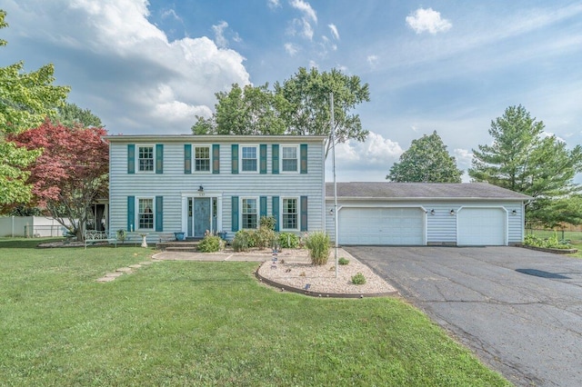 537 Dunkle Rd, Circleville, OH 43113 - colonial house featuring a garage and driveway