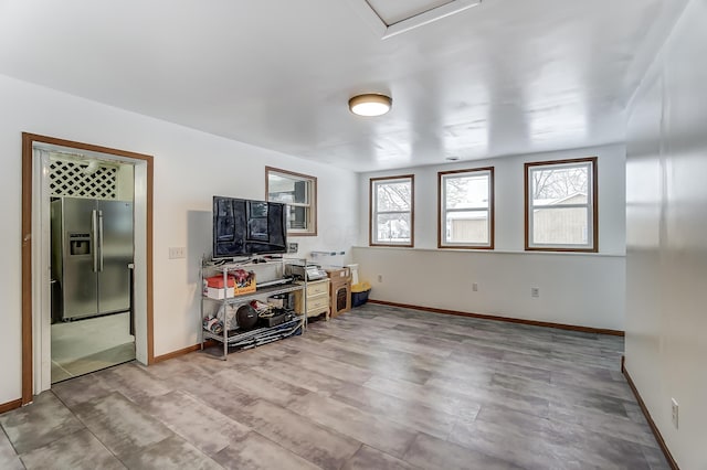 1919 Oakland Pkwy, Lima, OH 45805 - living room featuring baseboards and light wood finished floors