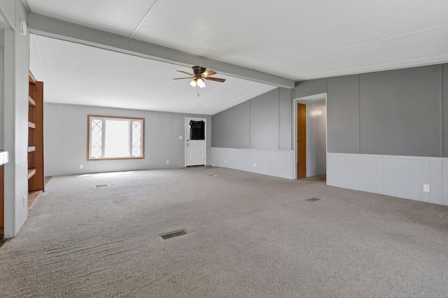 264 Timberline Dr, Circleville, OH 43113 - carpeted empty room featuring a ceiling fan, a decorative wall, and wainscoting