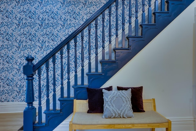 1017 Madison Ave, Columbus, OH 43205 - stairway with wood finished floors and baseboards