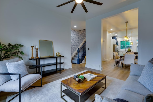 1017 Madison Ave, Columbus, OH 43205 - living room with a ceiling fan, stairway, wood finished floors, and recessed lighting