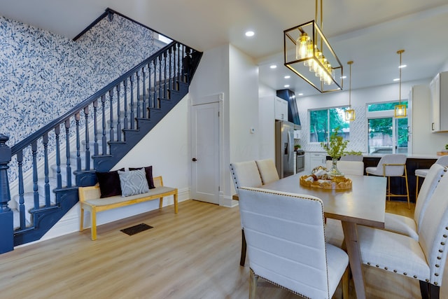 1017 Madison Ave, Columbus, OH 43205 - dining room with stairway, light wood finished floors, and recessed lighting