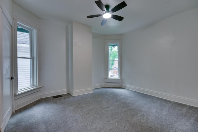 1017 Madison Ave, Columbus, OH 43205 - carpeted spare room featuring baseboards and a ceiling fan