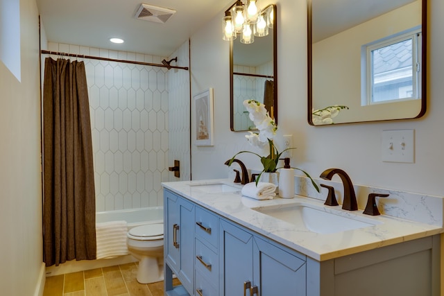 1017 Madison Ave, Columbus, OH 43205 - full bath featuring double vanity and shower / tub combo with curtain