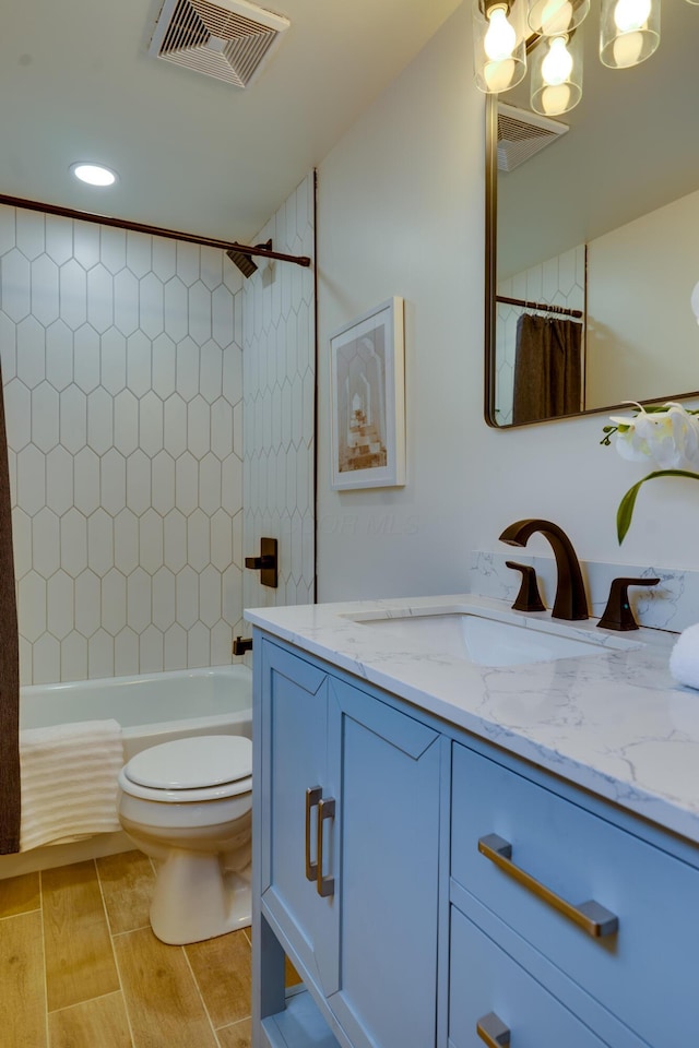 1017 Madison Ave, Columbus, OH 43205 - full bathroom with vanity, shower / bath combo with shower curtain, and wood finished floors