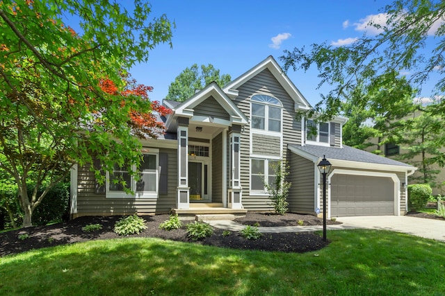 4775 Saint Andrews Dr, Westerville, OH 43082 - view of front of house featuring concrete driveway, an attached garage, and a front yard