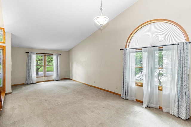 4775 Saint Andrews Dr, Westerville, OH 43082 - unfurnished living room featuring vaulted ceiling and carpet