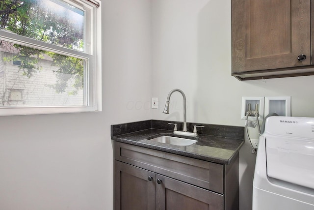 1366 Cole St, Columbus, OH 43205 - laundry room with washer / clothes dryer and cabinet space