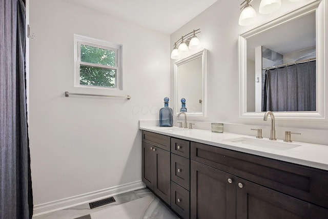1366 Cole St, Columbus, OH 43205 - bathroom featuring double vanity and a shower with curtain