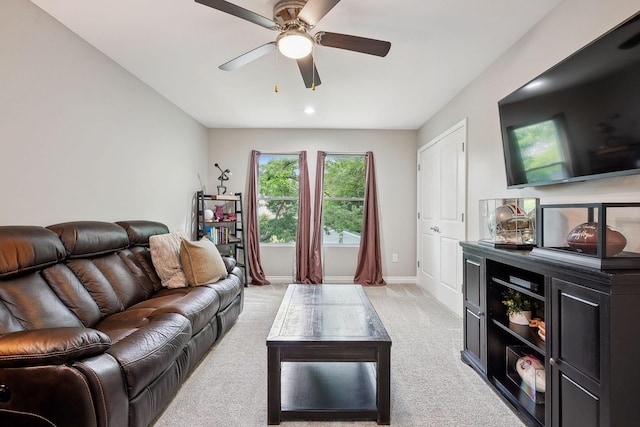 1366 Cole St, Columbus, OH 43205 - living room featuring a ceiling fan and light colored carpet