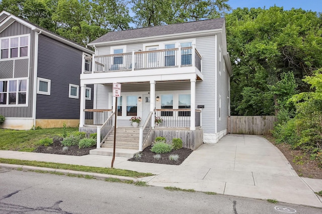 1366 Cole St, Columbus, OH 43205 - view of property with a balcony and covered porch