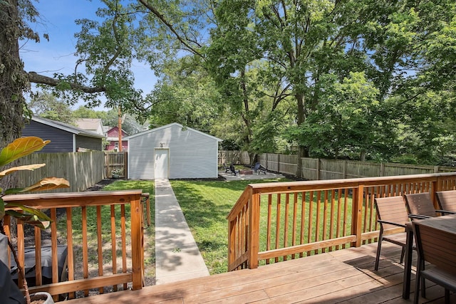 1366 Cole St, Columbus, OH 43205 - wooden deck with a fenced backyard, outdoor dining space, and a storage unit