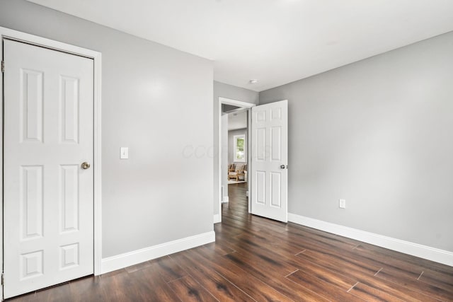 4425 Saint Ann Ln, Columbus, OH 43213 - unfurnished bedroom with dark wood-style floors