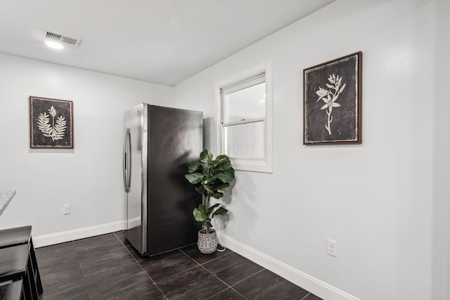 4425 Saint Ann Ln, Columbus, OH 43213 - sitting room with baseboards and dark tile patterned flooring
