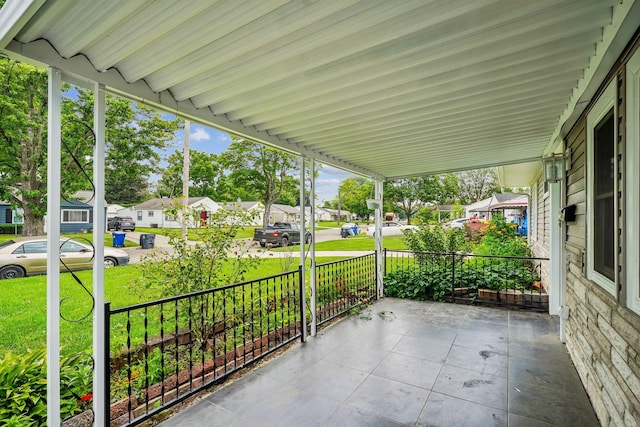 4425 Saint Ann Ln, Columbus, OH 43213 - porch with a residential view and a yard