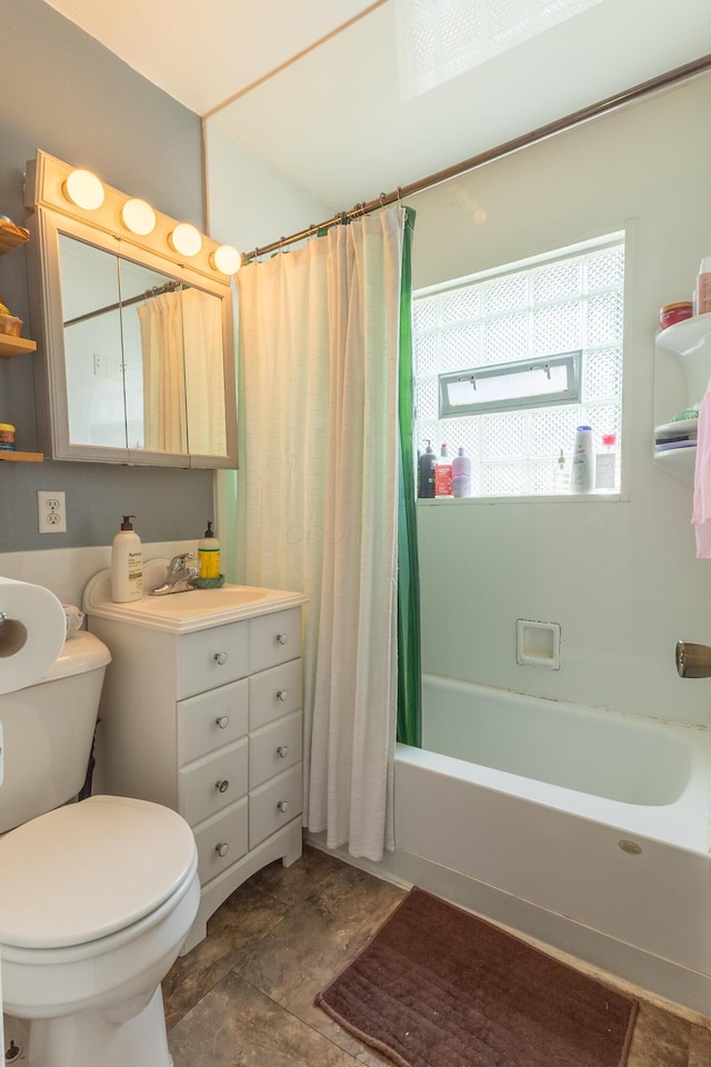 1345 Shanley Dr, Columbus, OH 43224 - bathroom featuring shower / bath combo with shower curtain and vanity