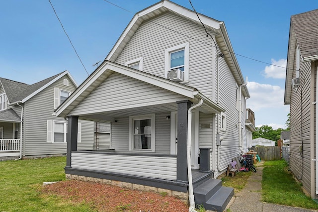 67 W Columbus St, Mount Sterling, OH 43143 - view of front facade featuring a porch and cooling unit