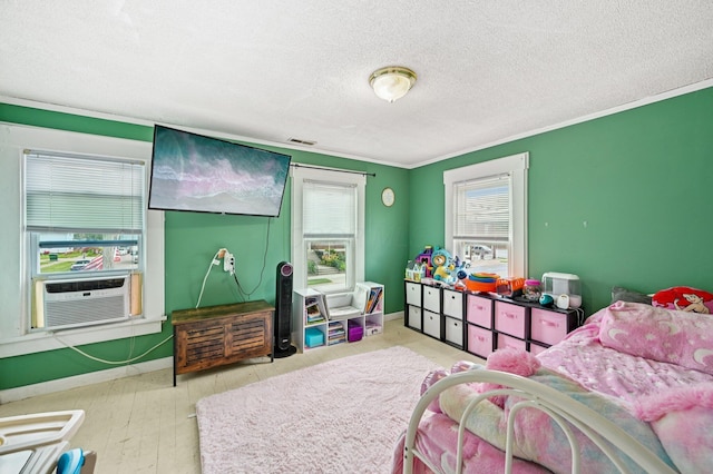 67 W Columbus St, Mount Sterling, OH 43143 - bedroom with a textured ceiling and cooling unit