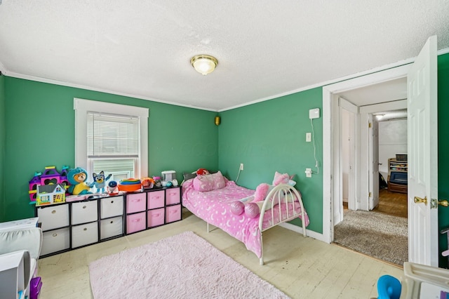 67 W Columbus St, Mount Sterling, OH 43143 - bedroom with a textured ceiling, wood finished floors, and ornamental molding