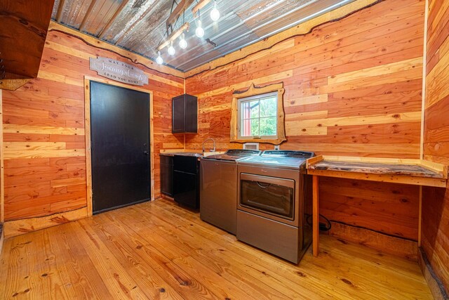 7326 State Route 19 Unit 8, Lots 255-257, Mount Gilead, OH 43338 - kitchen with separate washer and dryer, light wood-type flooring, wood walls, and dark cabinetry