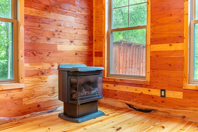 7326 State Route 19 Unit 8, Lots 255-257, Mount Gilead, OH 43338 - detailed view of a wood stove and wood finished floors