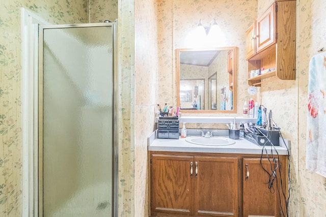 1609 Foraker Ave, Findlay, OH 45840 - bathroom featuring wallpapered walls, a shower stall, and vanity