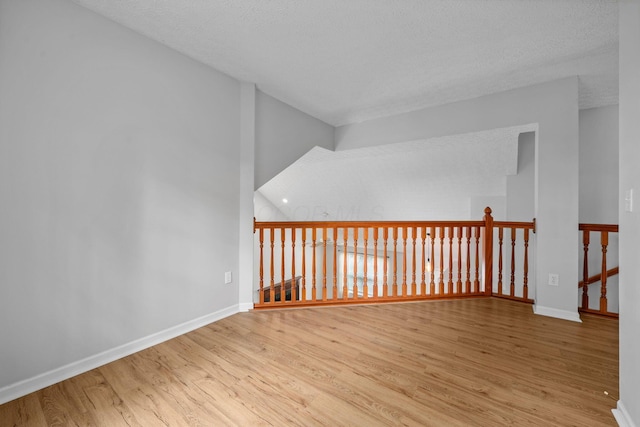 8135 Barlow Rd, Westerville, OH 43081 - empty room featuring wood finished floors and a textured ceiling