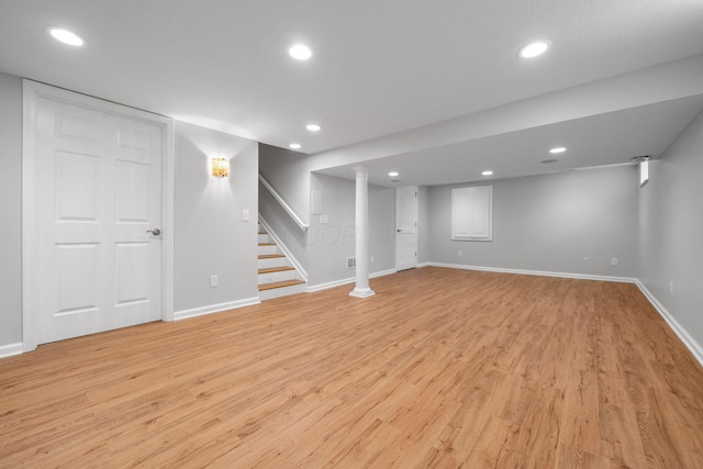 8135 Barlow Rd, Westerville, OH 43081 - finished basement with light wood finished floors, recessed lighting, and stairs
