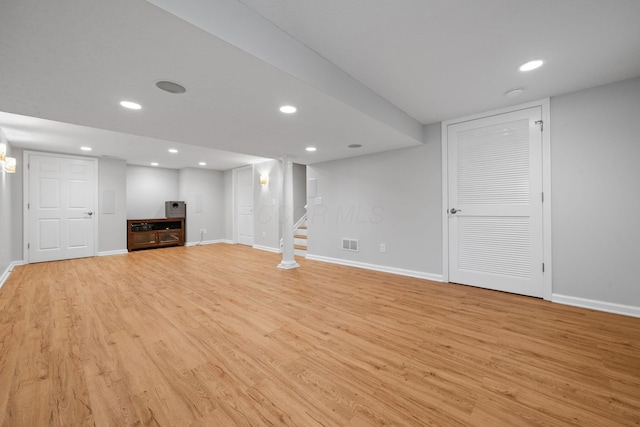 8135 Barlow Rd, Westerville, OH 43081 - finished basement featuring light wood-style floors, recessed lighting, and stairs