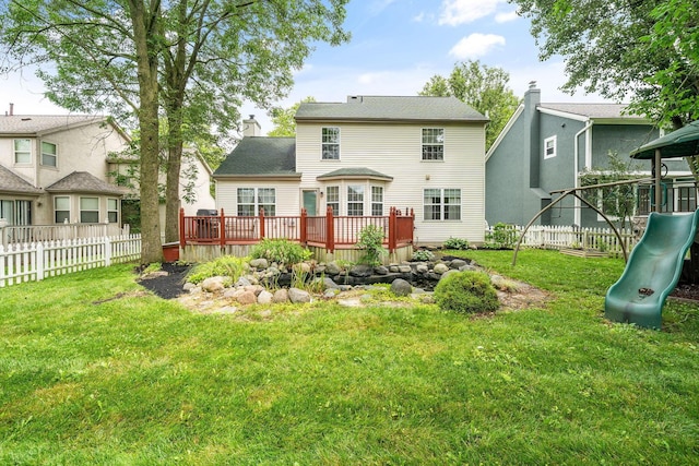8135 Barlow Rd, Westerville, OH 43081 - rear view of property with a playground, a deck, and a chimney