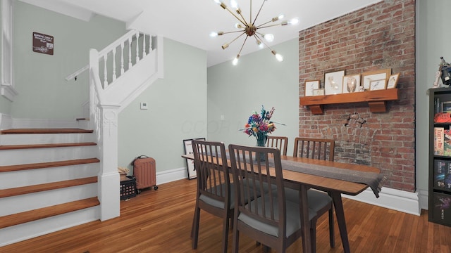 737 Wilson Ave, Columbus, OH 43205 - dining room with a chandelier, stairs, and wood finished floors