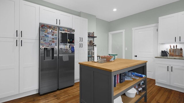 737 Wilson Ave, Columbus, OH 43205 - kitchen with stainless steel fridge with ice dispenser, wood counters, white cabinets, dark wood-style flooring, and recessed lighting
