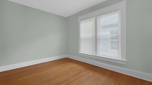 737 Wilson Ave, Columbus, OH 43205 - empty room with baseboards and light wood-style floors