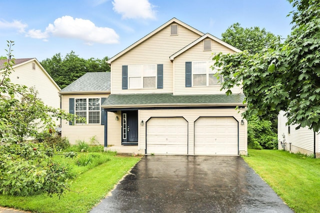 3576 Blendon Bend Way, Columbus, OH 43231 - view of front of home with asphalt driveway, a garage, a front lawn, and roof with shingles