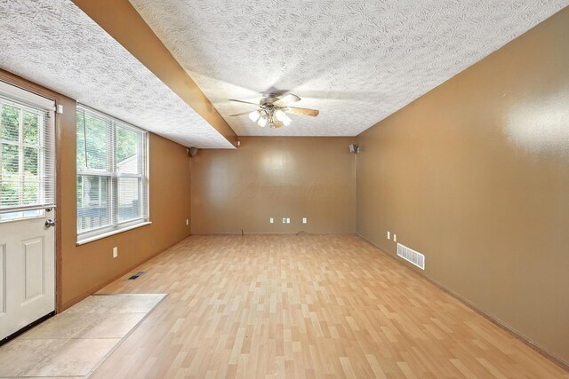 3576 Blendon Bend Way, Columbus, OH 43231 - empty room with light wood-type flooring, ceiling fan, and a textured ceiling