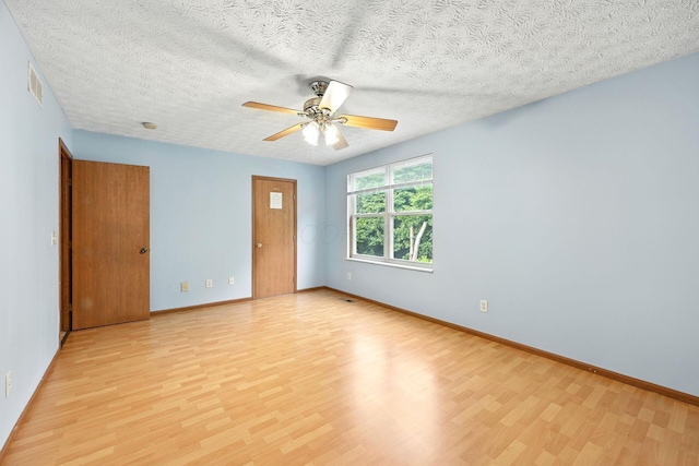 3576 Blendon Bend Way, Columbus, OH 43231 - empty room featuring light wood finished floors, a ceiling fan, and a textured ceiling