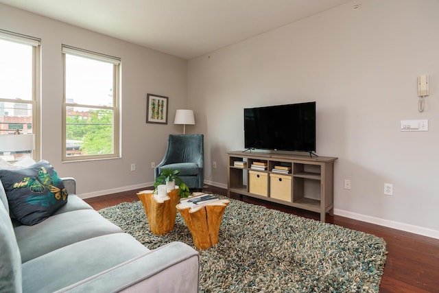 115 E Noble St Unit 2, Columbus, OH 43215 - living room with dark wood finished floors and baseboards