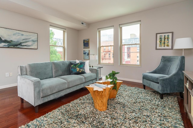115 E Noble St Unit 2, Columbus, OH 43215 - living area featuring dark wood finished floors and baseboards