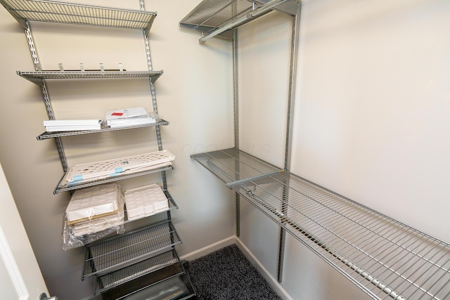 115 E Noble St Unit 2, Columbus, OH 43215 - spacious closet featuring carpet floors