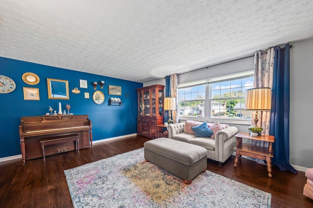 3221 E Hudson St, Columbus, OH 43219 - living room featuring a textured ceiling and wood finished floors