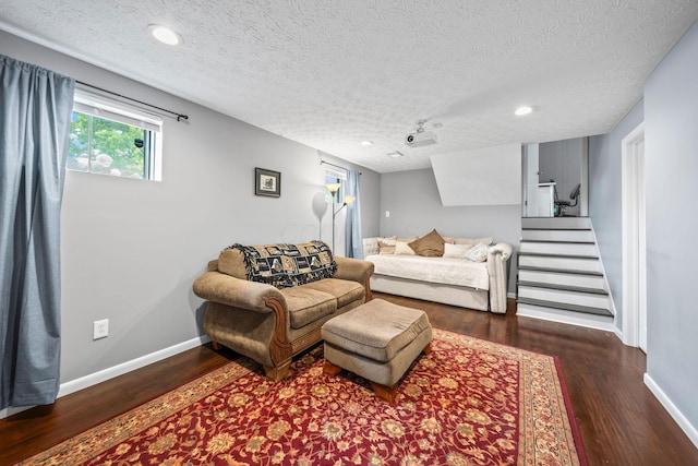 3221 E Hudson St, Columbus, OH 43219 - bedroom with wood finished floors, a textured ceiling, and recessed lighting
