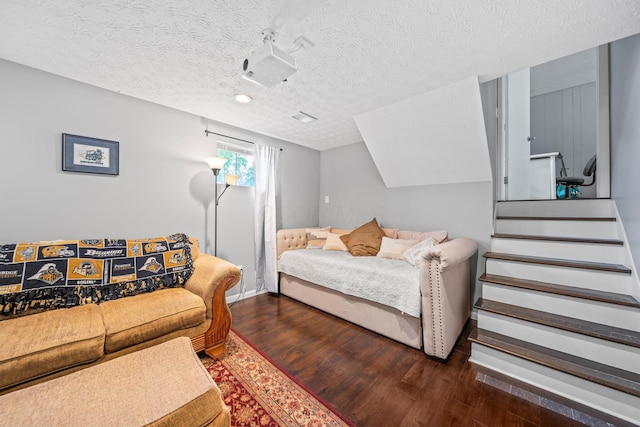 3221 E Hudson St, Columbus, OH 43219 - bedroom featuring wood finished floors, a textured ceiling, and recessed lighting