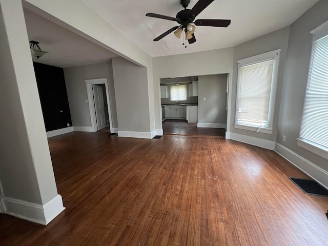 68 Moull St, Newark, OH 43055 - unfurnished living room featuring dark wood-style floors and ceiling fan