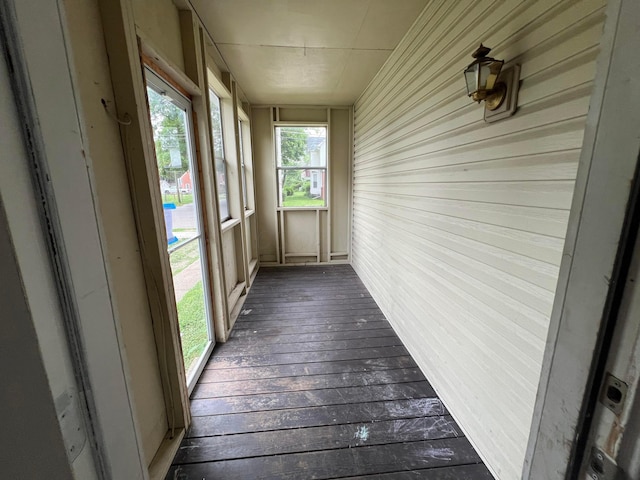 68 Moull St, Newark, OH 43055 - unfurnished sunroom with hardwood / wood-style flooring and wooden walls