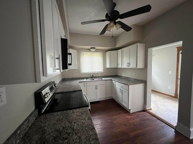 68 Moull St, Newark, OH 43055 - kitchen featuring stainless steel electric range oven, black microwave, a ceiling fan, dark wood finished floors, and white cabinetry