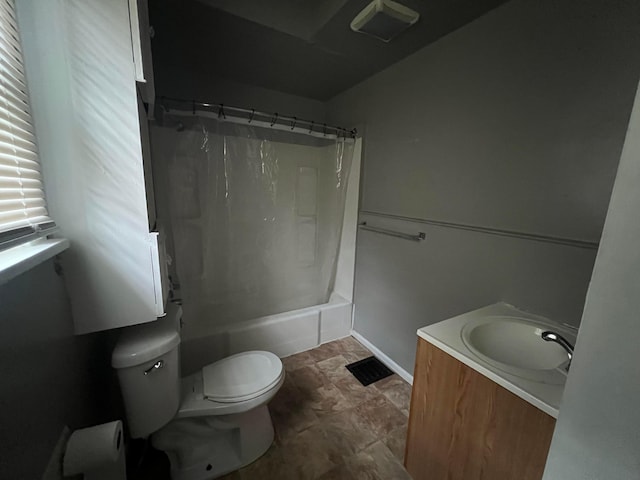 68 Moull St, Newark, OH 43055 - bathroom featuring vanity, shower / bath combo with shower curtain, and stone finish flooring
