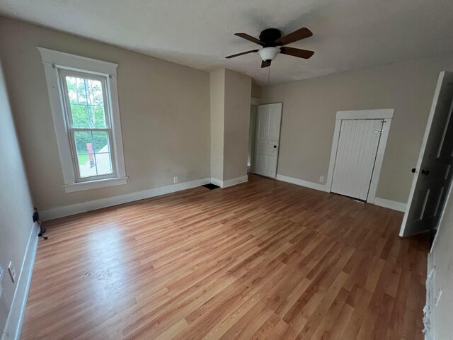 68 Moull St, Newark, OH 43055 - unfurnished bedroom featuring light wood-style floors and a ceiling fan